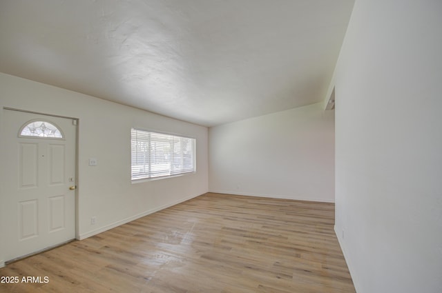 entrance foyer with light hardwood / wood-style flooring