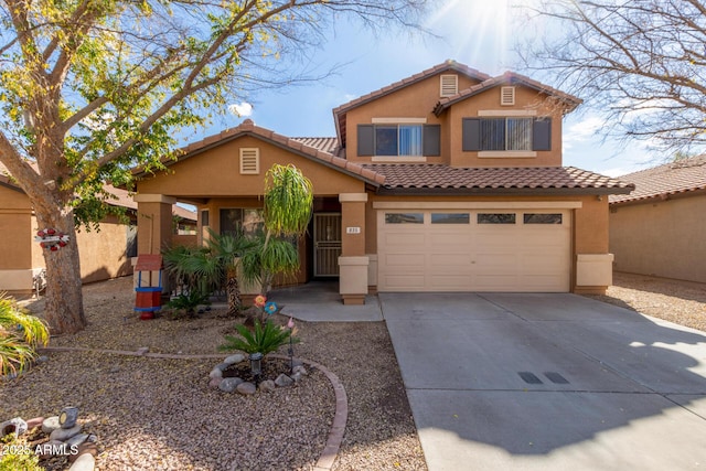 view of front of home with a garage