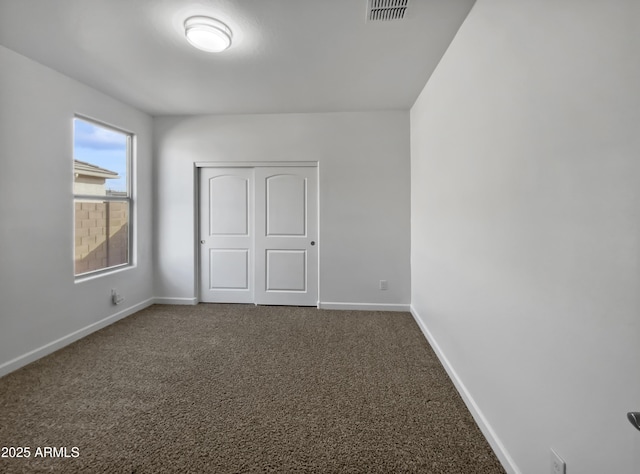 spare room with carpet