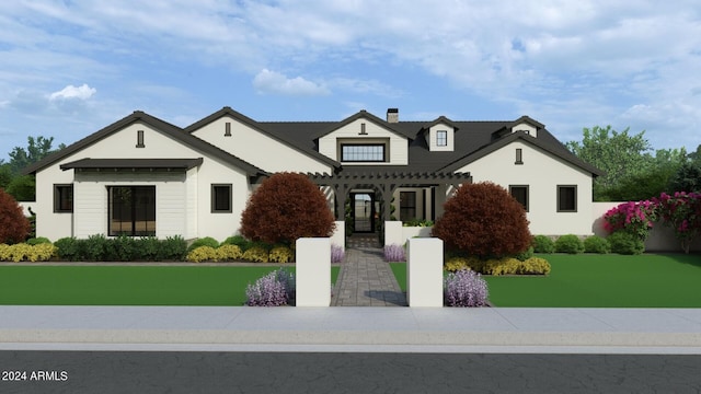 view of front of property featuring a front yard and a chimney