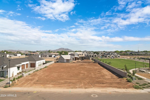 birds eye view of property with a residential view and a mountain view