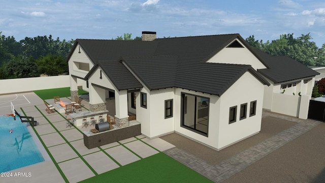 rear view of house featuring stucco siding, a chimney, a patio, and fence