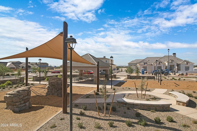 view of yard with a gazebo, a patio area, and a residential view