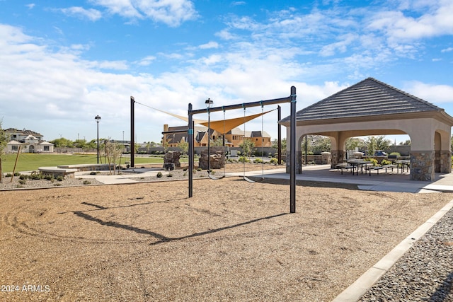 view of home's community with a gazebo and playground community