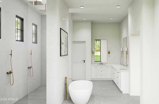 bathroom featuring a soaking tub, tile walls, vanity, and a walk in shower