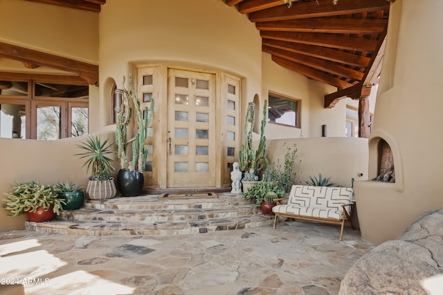 entrance to property with french doors and a patio