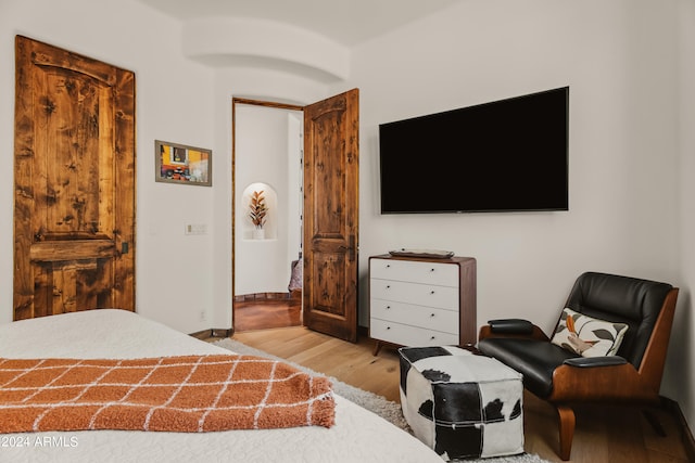 bedroom with light hardwood / wood-style floors