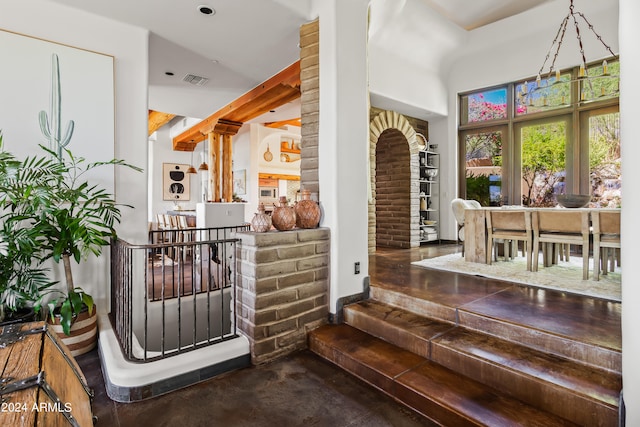 entrance foyer featuring concrete floors