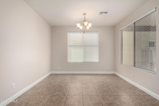 3449 E Sheffield Rd, Gilbert, AZ 85296 - spare room featuring a chandelier, light tile patterned flooring, and baseboards