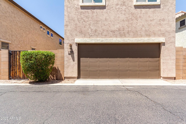 3449 E Sheffield Rd, Gilbert, AZ 85296 - view of front of home with a garage and stucco siding