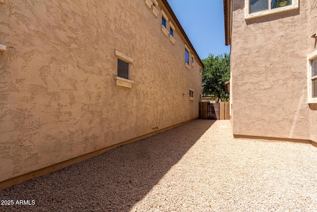 3449 E Sheffield Rd, Gilbert, AZ 85296 - view of side of home featuring stucco siding