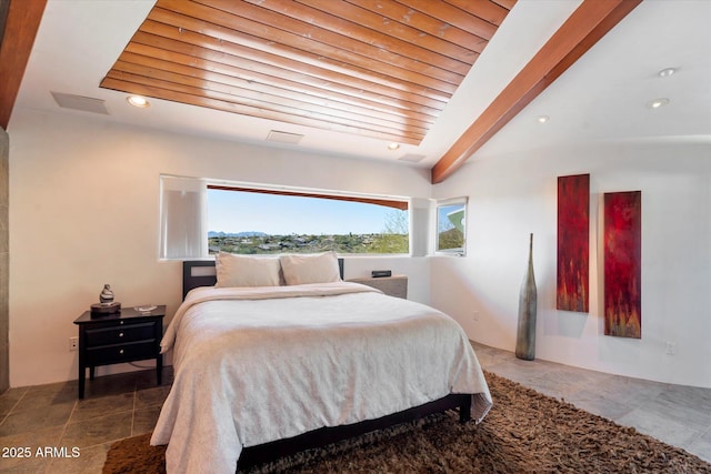 bedroom featuring beamed ceiling