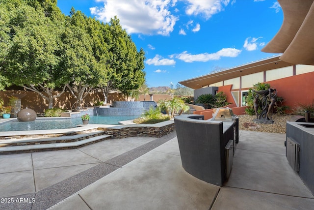 view of patio featuring an outdoor kitchen