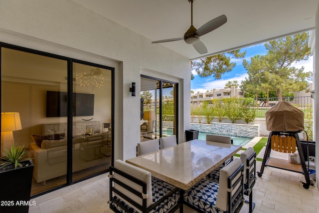 2737 E Arizona Biltmore Cir Unit 8, Phoenix, AZ 85016 - sunroom featuring healthy amount of natural light and a chandelier