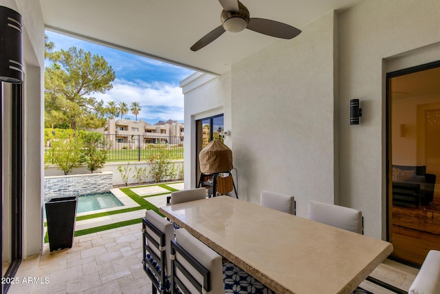2737 E Arizona Biltmore Cir Unit 8, Phoenix, AZ 85016 - view of patio featuring a ceiling fan and exterior bar