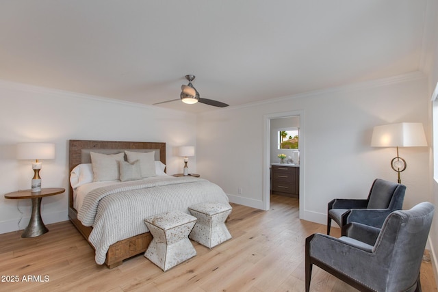 2737 E Arizona Biltmore Cir Unit 8, Phoenix, AZ 85016 - bedroom featuring ornamental molding, light wood-style floors, baseboards, and a ceiling fan