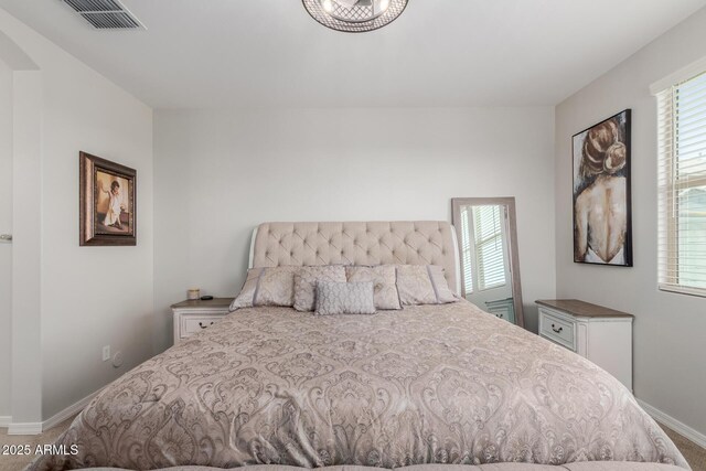 15276 W Latham St, Goodyear, AZ 85338 - bedroom featuring carpet flooring and arched walkways