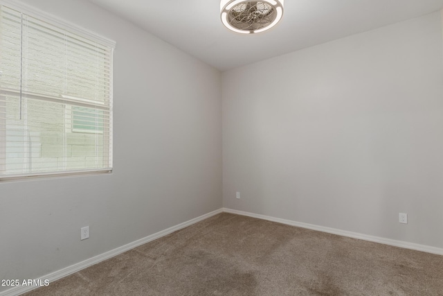 15276 W Latham St, Goodyear, AZ 85338 - carpeted empty room with baseboards
