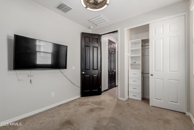 15276 W Latham St, Goodyear, AZ 85338 - unfurnished bedroom featuring light carpet and baseboards
