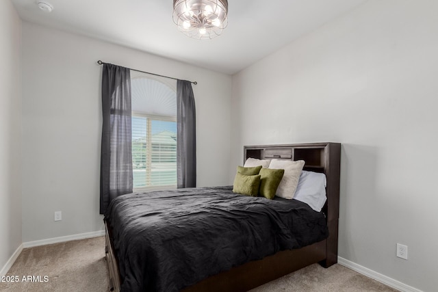 15276 W Latham St, Goodyear, AZ 85338 - carpeted bedroom with baseboards