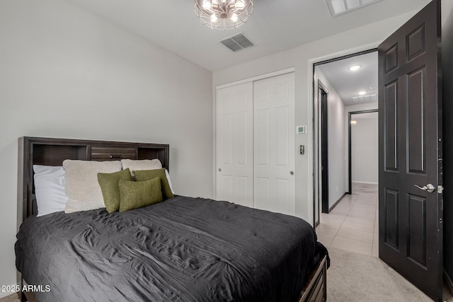 15276 W Latham St, Goodyear, AZ 85338 - bedroom with light tile patterned floors, a closet, and recessed lighting