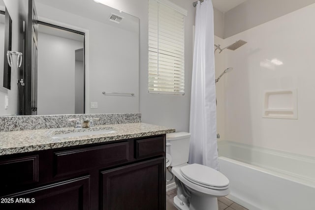 15276 W Latham St, Goodyear, AZ 85338 - bathroom featuring vanity, shower / bath combo, and tile patterned flooring