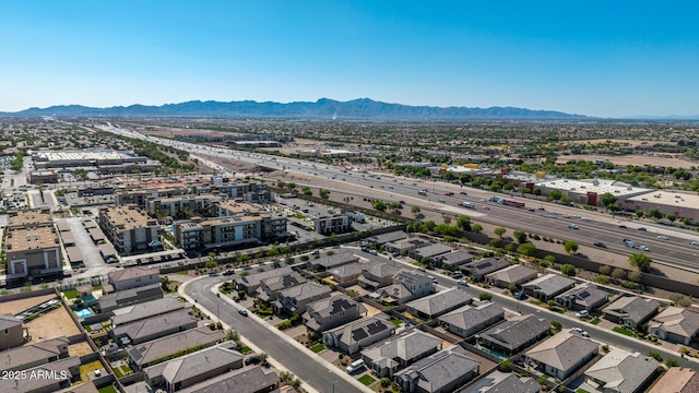 15276 W Latham St, Goodyear, AZ 85338 - aerial view of residential area with a mountain backdrop and a major roadway