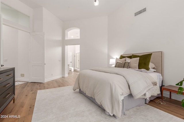 bedroom featuring light hardwood / wood-style flooring