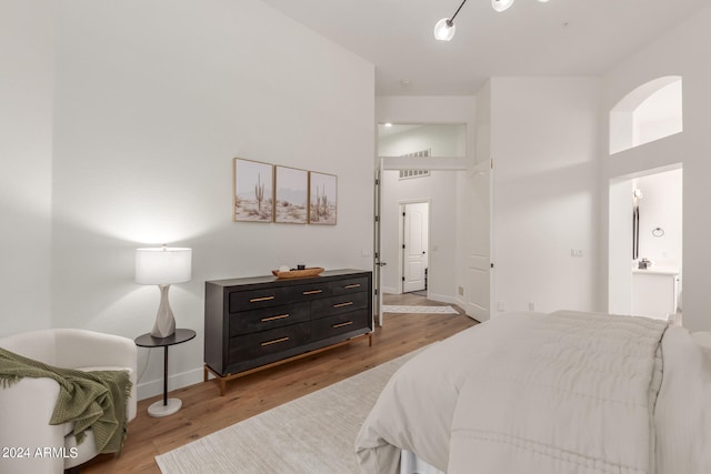 bedroom with light hardwood / wood-style flooring