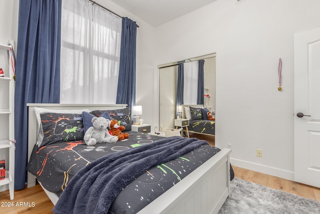 bedroom featuring hardwood / wood-style flooring