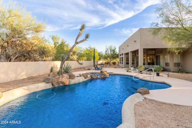 view of pool featuring a patio