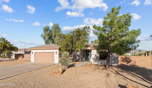 view of front of property with a garage