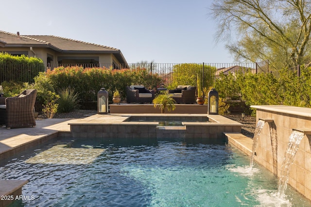 view of swimming pool with a patio area, a pool with connected hot tub, and fence