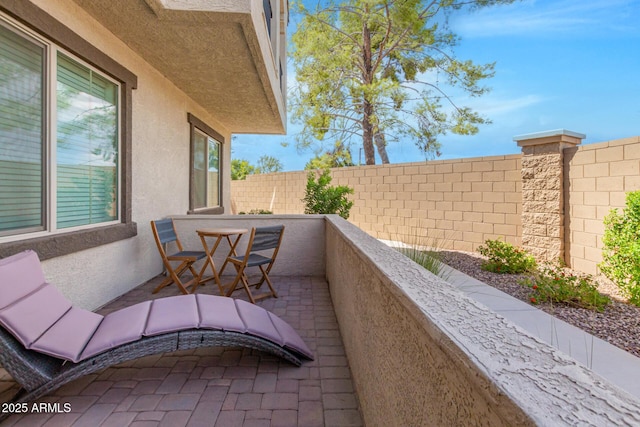 view of patio / terrace featuring a balcony