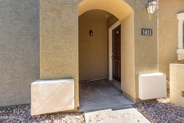 2402 E 5th St Unit 1411, Tempe, AZ 85288 - doorway to property with stucco siding