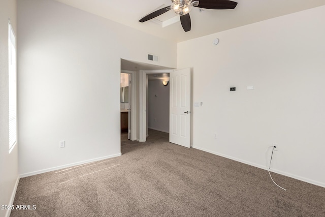2402 E 5th St Unit 1411, Tempe, AZ 85288 - empty room featuring carpet flooring, a ceiling fan, and baseboards