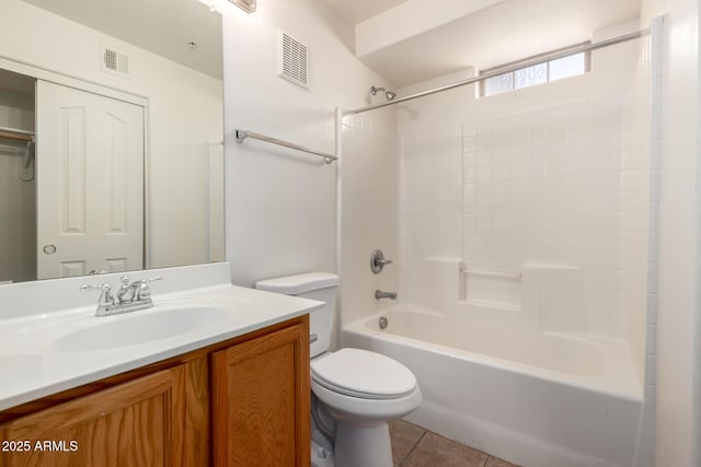 2402 E 5th St Unit 1411, Tempe, AZ 85288 - bathroom featuring toilet, vanity, shower / washtub combination, and tile patterned floors