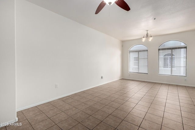 2402 E 5th St Unit 1411, Tempe, AZ 85288 - tiled empty room with ceiling fan, a chandelier, and baseboards