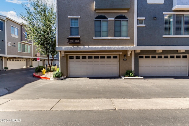 2402 E 5th St Unit 1411, Tempe, AZ 85288 - multi unit property featuring stucco siding and a garage