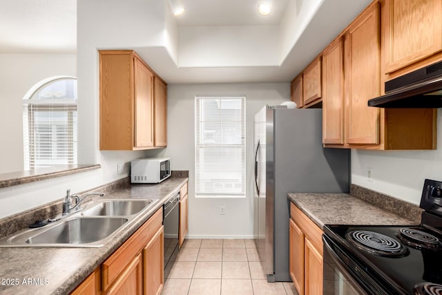 2402 E 5th St Unit 1411, Tempe, AZ 85288 - kitchen featuring black appliances, a sink, under cabinet range hood, and plenty of natural light