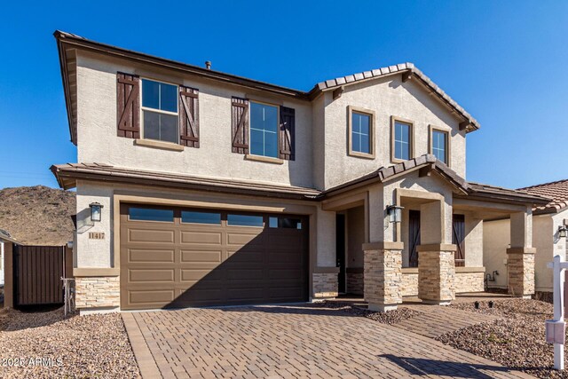 front facade with a garage