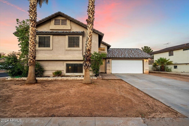 view of front of house with a garage