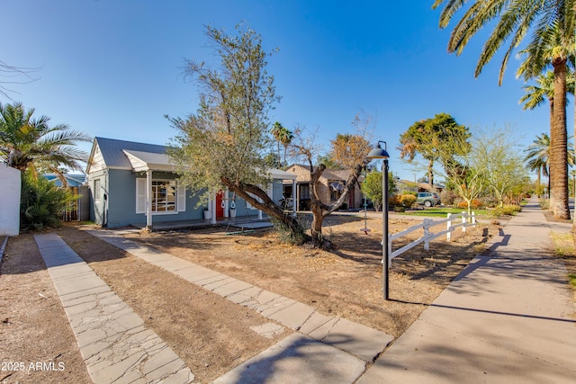 view of front of home with fence