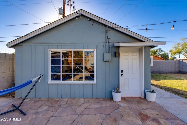 exterior space with a patio and fence