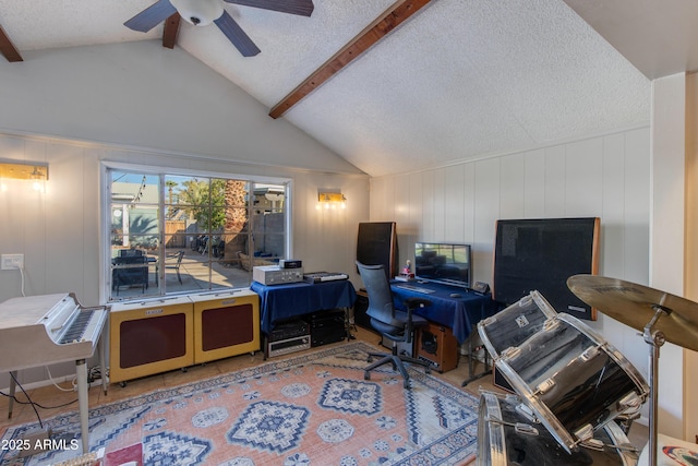 home office featuring a textured ceiling, vaulted ceiling with beams, and a ceiling fan