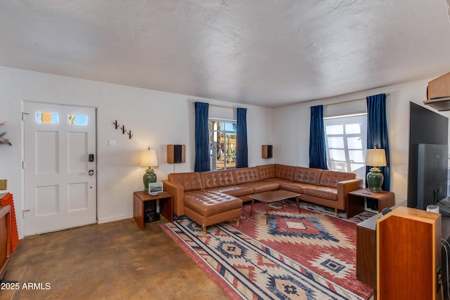 living room with concrete floors