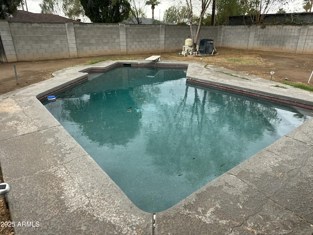 view of pool featuring a fenced backyard and a fenced in pool