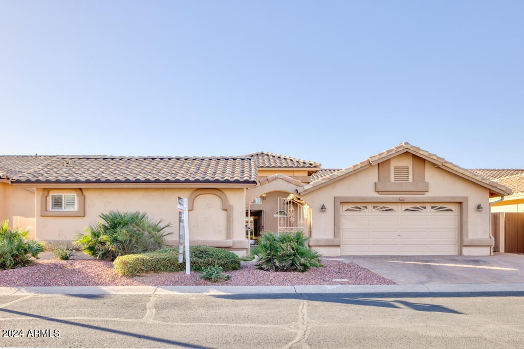 view of front of home with a garage