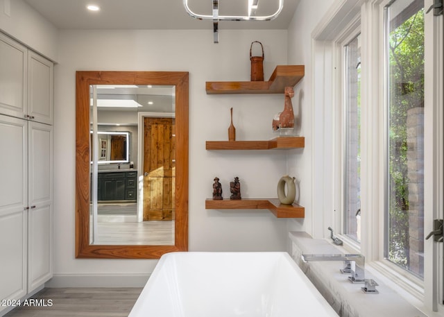 bedroom with light hardwood / wood-style flooring