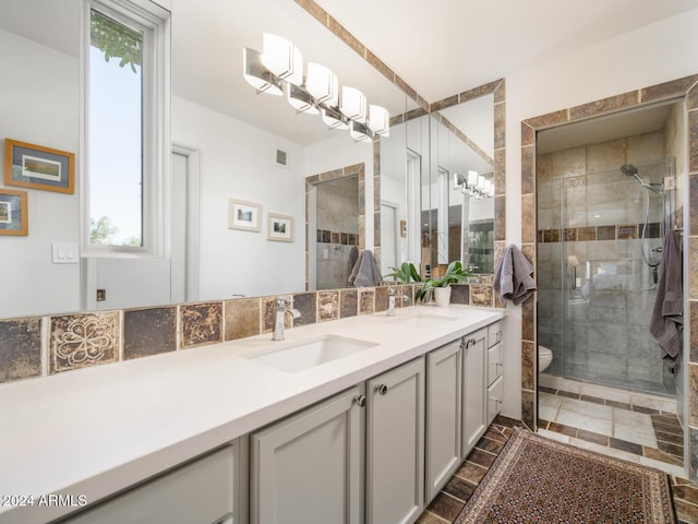 bathroom with vanity and walk in shower